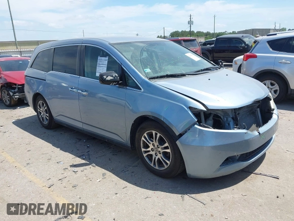 2013 Honda Odyssey EX z VIN 5FNRL5H4XDB062760, wystawiony jako IAAI lot #42063899 z przebiegiem 181 658 mil mil oraz . Historia ofert i sprzedaży dostępna na DreamBid. Obrazek 1.