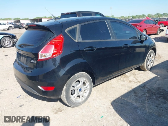 2016 Ford Fiesta SE z VIN 3FADP4EJ3GM146945, wystawiony jako IAAI lot #41975149 z przebiegiem 186 421 mil mil oraz . Historia ofert i sprzedaży dostępna na DreamBid. Obrazek 4.