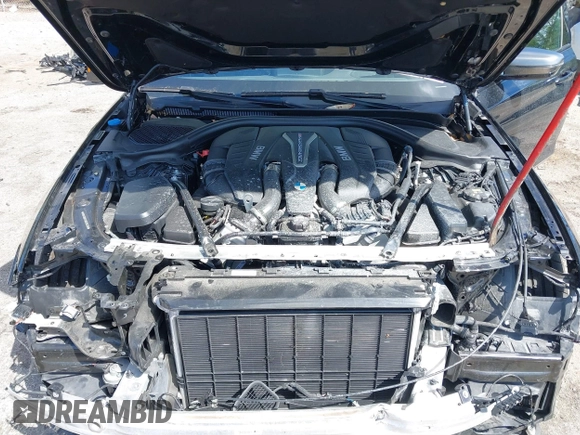 2019 BMW 5 Series M550i xDrive with VIN WBAJB9C51KB289355, listed as a IAAI auction lot 41867984 with 30,106 mi miles and . Bid and sale history available at DreamBid. Image 10.