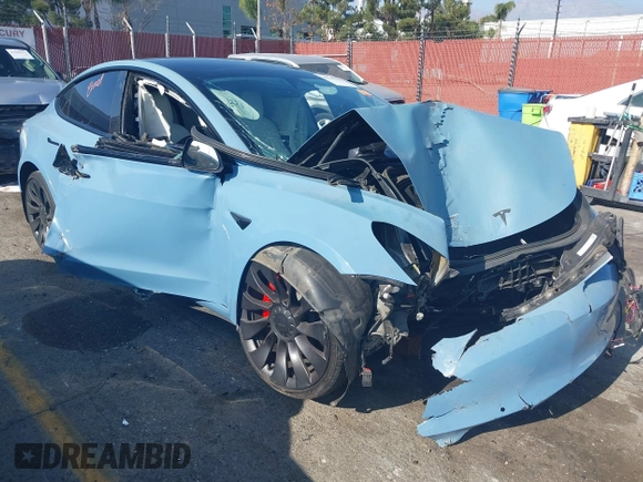 2022 Tesla Model 3 Performance with VIN 5YJ3E1EC1NF144236, listed as a IAAI auction lot 41189644 with Not Provided miles. Bid and sale history available at carsss.com. Image 1.