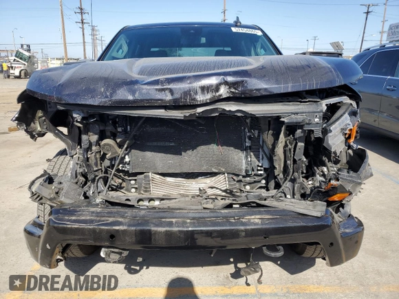 2023 Chevrolet Silverado 1500 Custom with VIN 3GCPDBEKXPG132407, listed as a Copart auction lot 57454865 with 64,832 mi miles and Salvage Title. Bid and sale history available at DreamBid. Image 5.