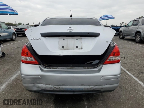 2009 Nissan Versa 1.6 with VIN 3N1CC11E79L429613, listed as a Copart auction lot 72220034 with 134,891 mi miles and Salvage Title. Bid and sale history available at carsss.com. Image 6.