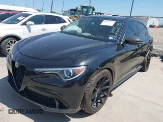 2018 Alfa Romeo Stelvio Sport z VIN ZASFAKPN1J7B82358, wystawiony jako IAAI lot #41984977 z przebiegiem 89 518 mil mil oraz . Historia ofert i sprzedaży dostępna na DreamBid. Obrazek 2.