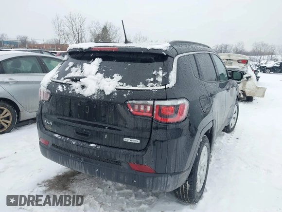 2018 Jeep Compass Altitude with VIN 3C4NJDBB6JT307069, listed as a IAAI auction lot 41351646 with 50,387 mi miles and . Bid and sale history available at carsss.com. Image 4.