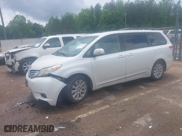2014 Toyota Sienna XLE with VIN 5TDYK3DC2ES517663, listed as a IAAI auction lot 42171862 with 143,447 mi miles and . Bid and sale history available at DreamBid. Image 19.