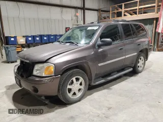 2008 GMC Envoy SLE2 with VIN 1GKDS13S482236329, listed as a Copart auction lot 87001674 with 150,807 mi miles and Salvage Title. Bid and sale history available at carsss.com. Image 1.
