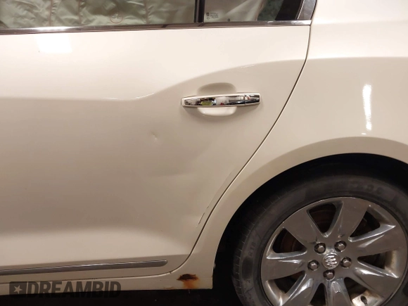 2012 Buick LaCrosse Premium 2 with VIN 1G4GF5E32CF105505, listed as a IAAI auction lot 42498399 with 168,814 mi miles and . Bid and sale history available at DreamBid. Image 17.