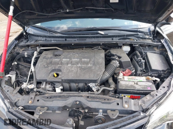2019 Toyota Corolla L with VIN 5YFBURHE1KP923291, listed as a IAAI auction lot 42173538 with 60,184 mi miles and . Bid and sale history available at DreamBid. Image 10.