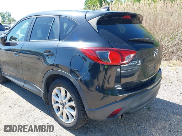 2013 Mazda CX-5 Grand Touring with VIN JM3KE4DE6D0127601, listed as a IAAI auction lot 42143558 with 95,719 mi miles and . Bid and sale history available at DreamBid. Image 6.