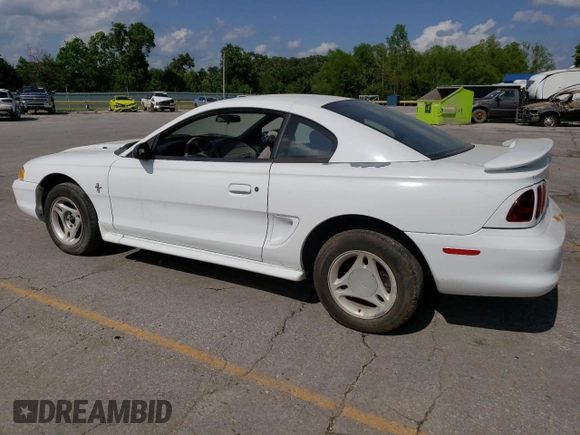 1996 Ford Mustang with VIN 1FALP4041TF206244, listed as a Copart auction lot 56311934 with 123,572 mi miles and Salvage Title. Bid and sale history available at carsss.com. Image 2.