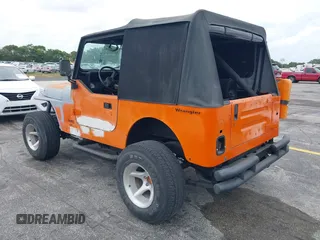 1991 Jeep Wrangler with VIN 2J4FY29SXMJ105443, listed as a IAAI auction lot 41964359 with 1,674,923 mi miles. Bid and sale history available at carsss.com. Image 3.