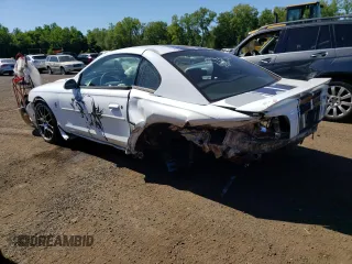 1996 Ford Mustang with VIN 1FALP4045TF220891, listed as a Copart auction lot 60832954 with 194,257 mi miles and Salvage Title. Bid and sale history available at carsss.com. Image 2.