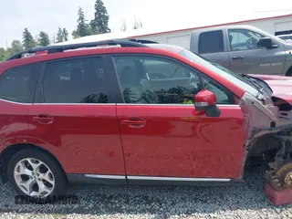 2017 Subaru Forester Touring with VIN JF2SJATC9HH576959, listed as a IAAI auction lot 42550955 with 138,810 mi miles and . Bid and sale history available at DreamBid. Image 14.