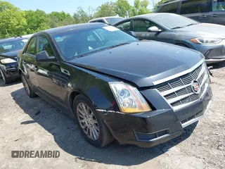 2011 Cadillac CTS z VIN 1G6DC5EYXB0171316, wystawiony jako IAAI lot #42056001 z przebiegiem 197 781 mil mil oraz . Historia ofert i sprzedaży dostępna na DreamBid. Obrazek 1.