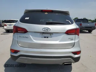 2018 Hyundai Santa Fe 2.4L z VIN 5XYZTDLB5JG551524, wystawiony jako Copart lot #57170985 z przebiegiem 139 248 mil mil oraz Szkoda całkowita • Salvage title. Historia ofert i sprzedaży dostępna na DreamBid. Obrazek 6.