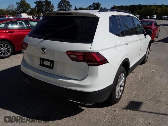 2020 Volkswagen Tiguan S with VIN 3VV1B7AXXLM084866, listed as a Copart auction lot 33149061 with 2,439 mi miles and Salvage title. Bid and sale history available at DreamBid. Image 4.