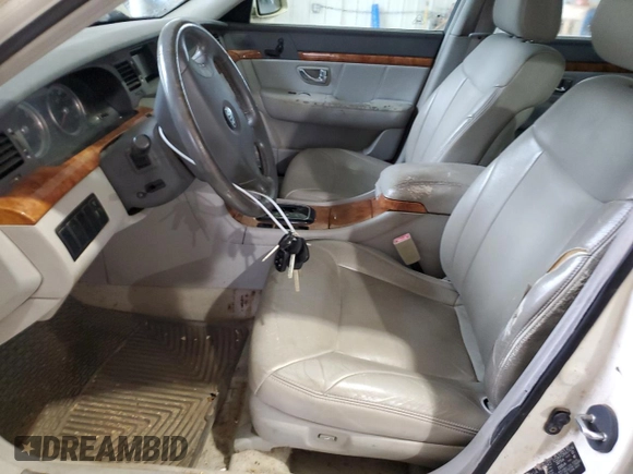2004 Kia Amanti z VIN KNALD124145035031, wystawiony jako Copart lot #81294924 z przebiegiem 136 941 mil mil oraz Czysty tytuł • Clean title. Historia ofert i sprzedaży dostępna na DreamBid. Obrazek 7.