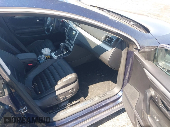 2014 Volkswagen CC Sport z VIN WVWBN7AN7EE511759, wystawiony jako IAAI lot #42002504 z przebiegiem 111 900 mil mil oraz . Historia ofert i sprzedaży dostępna na DreamBid. Obrazek 5.