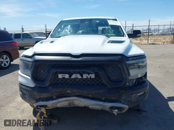 2022 Ram 1500 Rebel z VIN 1C6SRFLT4NN357352, wystawiony jako IAAI lot #41881613 z przebiegiem 31 285 mil mil oraz . Historia ofert i sprzedaży dostępna na DreamBid. Obrazek 11.