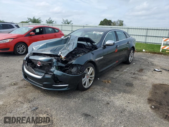 2014 Jaguar XJ Portfolio with VIN SAJWJ2GD4E8V70170, listed as a Copart auction lot 69662054 with 121,188 mi miles and Non repairable. Bid and sale history available at DreamBid. Image 1.