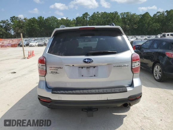 2014 Subaru Forester Touring z VIN JF2SJAMC0EH495620, wystawiony jako Copart lot #58036665 z przebiegiem 159 538 mil mil oraz Czysty tytuł • Clean title. Historia ofert i sprzedaży dostępna na DreamBid. Obrazek 6.