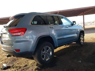2012 Jeep Grand Cherokee Limited with VIN 1C4RJFBG2CC317363, listed as a IAAI auction lot 41689903 with 158,020 mi miles. Bid and sale history available at carsss.com. Image 4.