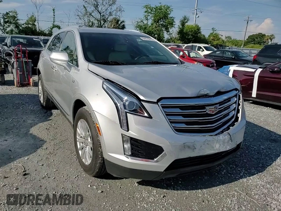 2019 Cadillac XT5 FWD with VIN 1GYKNARSXKZ194694, listed as a Copart auction lot 64476815 with 36,082 mi miles and Salvage title. Bid and sale history available at DreamBid. Image 14.