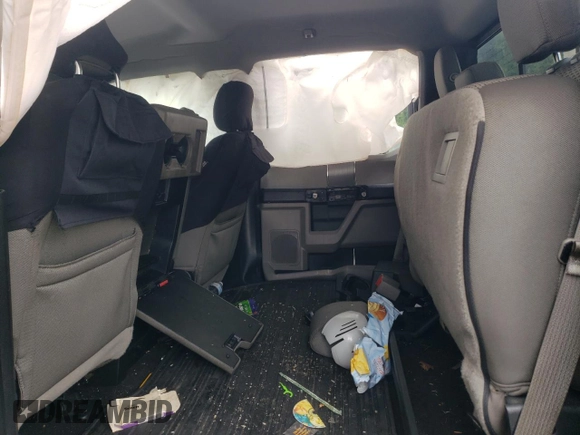 2015 Ford F-150 XLT with VIN 1FTEW1EP2FFB37060, listed as a Copart auction lot 58825175 with 133,438 mi miles and Salvage title. Bid and sale history available at DreamBid. Image 10.