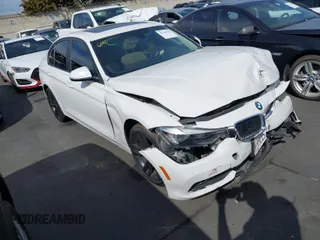 2016 BMW 3 Series 320i with VIN WBA8E1G55GNU11559, listed as a IAAI auction lot 41745322 with 113,233 mi miles and . Bid and sale history available at carsss.com. Image 1.