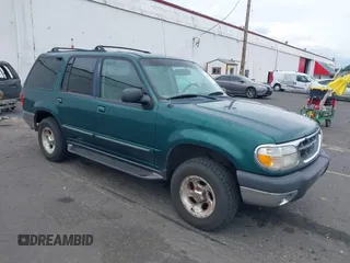 1999 Ford Explorer XLT with VIN 1FMZU34E1XZB72588, listed as a IAAI auction lot 42598441 with 233,717 mi miles and . Bid and sale history available at DreamBid. Image 1.