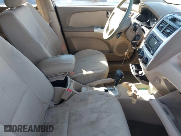 2010 Kia Sportage LX with VIN KNDKGCA32A7666414, listed as a IAAI auction lot 41598263 with 166,882 mi miles and . Bid and sale history available at carsss.com. Image 5.
