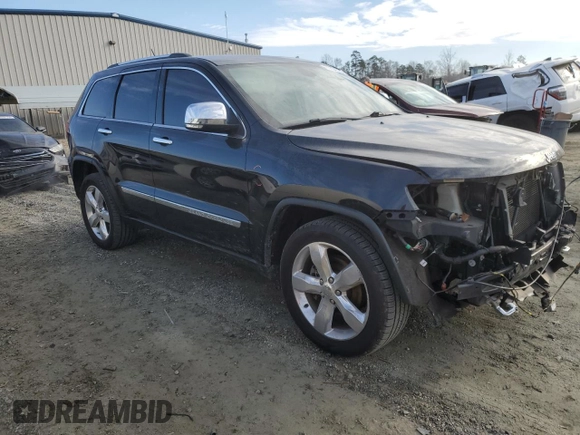 2013 Jeep Grand Cherokee Overland with VIN 1C4RJECT6DC655355, listed as a Copart auction lot 85654554 with 135,343 mi miles and Salvage Title. Bid and sale history available at carsss.com. Image 4.