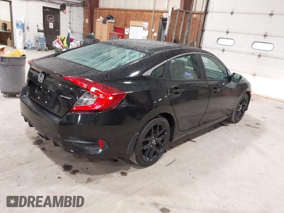 2019 Honda Civic Sport with VIN 2HGFC2F89KH557466, listed as a IAAI auction lot 42335216 with 138,747 mi miles and . Bid and sale history available at DreamBid. Image 4.