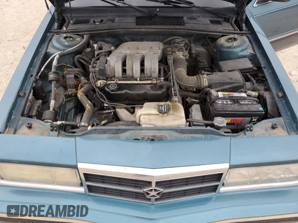 1993 Dodge Dynasty LE z VIN 1B3XC56R3PD124521, wystawiony jako Copart lot #51825725 z przebiegiem 94 336 mil mil oraz Szkoda całkowita • Salvage title. Historia ofert i sprzedaży dostępna na DreamBid. Obrazek 12.