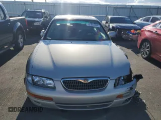 1997 Mazda Millenia S z VIN JM1TA2229V1307575, wystawiony jako Copart lot #87040954 z przebiegiem 160 513 mil mil oraz Szkody całkowita. Historia ofert i sprzedaży dostępna na DreamBid. Obrazek 5.