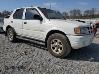 2004 Isuzu Rodeo S with VIN 4S2DM58W144310706, listed as a Copart auction lot 74980644 with 155,262 mi miles and Salvage Title. Bid and sale history available at DreamBid. Image 4.