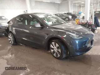2023 Tesla Model Y Long Range z VIN 7SAYGDEE5PA033341, wystawiony jako IAAI lot #41379625 z przebiegiem Nie podano mil oraz . Historia ofert i sprzedaży dostępna na DreamBid. Obrazek 1.