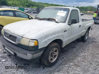 2001 Mazda B-Series Truck SX z VIN 4F4YR12C31TM09588, wystawiony jako IAAI lot #42261292 z przebiegiem 397 845 mil mil oraz . Historia ofert i sprzedaży dostępna na DreamBid. Obrazek 2.