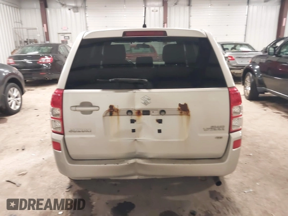 2012 Suzuki Grand Vitara Premium z VIN JS3TD0D62C4100440, wystawiony jako IAAI lot #41711815 z przebiegiem 171 527 mil mil oraz . Historia ofert i sprzedaży dostępna na DreamBid. Obrazek 16.