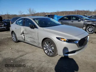 2022 Mazda 3 Carbon Edition with VIN 3MZBPACL0NM318377, listed as a Copart auction lot 50489375 with 47,326 mi miles and Salvage title. Bid and sale history available at DreamBid. Image 4.
