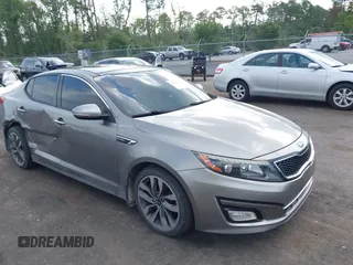2015 Kia Optima SXL Turbo with VIN 5XXGR4A60FG513223, listed as a IAAI auction lot 42590539 with 181,035 mi miles and . Bid and sale history available at DreamBid. Image 1.