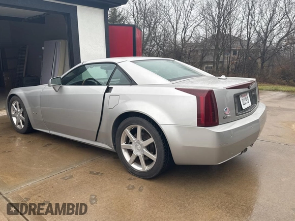 2005 Cadillac XLR z VIN 1G6YV34A255604073, wystawiony jako Copart lot #86889874 z przebiegiem 39 624 mil mil oraz Czysty tytuł • Clean title. Historia ofert i sprzedaży dostępna na DreamBid. Obrazek 3.