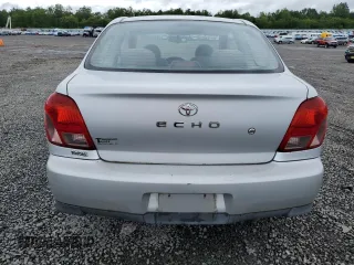 2001 Toyota ECHO with VIN JTDAT123810177910, listed as a Copart auction lot 57258295 with 35,405 mi miles and Salvage title. Bid and sale history available at DreamBid. Image 6.
