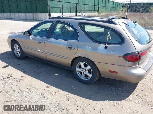 2003 Ford Taurus SE Standard with VIN 1FAHP58S13A147675, listed as a IAAI auction lot 42079930 with 87,523 mi miles and . Bid and sale history available at DreamBid. Image 3.