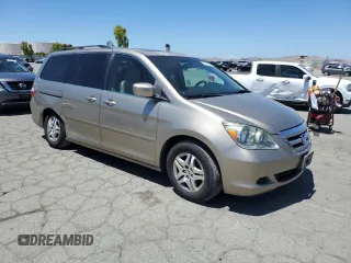 2005 Honda Odyssey EX-L with VIN 5FNRL38625B045152, listed as a Copart auction lot 57633005 with 145,776 mi miles and Salvage title. Bid and sale history available at DreamBid. Image 4.