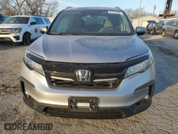 2020 Honda Pilot Touring 8-Passenger with VIN 5FNYF6H96LB029385, listed as a Copart auction lot 87391534 with 68,201 mi miles and Salvage Title. Bid and sale history available at DreamBid. Image 5.