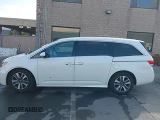 2015 Honda Odyssey Touring Elite with VIN 5FNRL5H9XFB102222, listed as a IAAI auction lot 42485059 with 123,562 mi miles and . Bid and sale history available at DreamBid. Image 14.