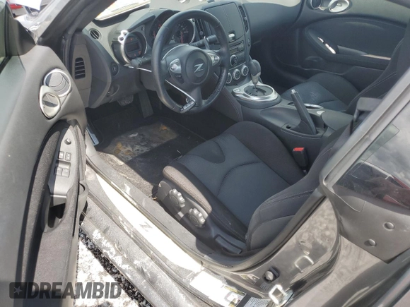 2014 Nissan 370Z with VIN JN1AZ4EH6EM633797, listed as a Copart auction lot 74027354 with Not Provided miles and Salvage Title. Bid and sale history available at DreamBid. Image 8.