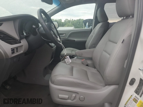 2015 Toyota Sienna XLE with VIN 5TDYK3DC6FS630405, listed as a Copart auction lot 59872045 with 60,306 mi miles and Salvage title. Bid and sale history available at DreamBid. Image 7.