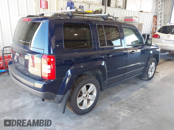 2014 Jeep Patriot Latitude with VIN 1C4NJRFB3ED863519, listed as a IAAI auction lot 42670843 with 220,920 mi miles and . Bid and sale history available at DreamBid. Image 4.